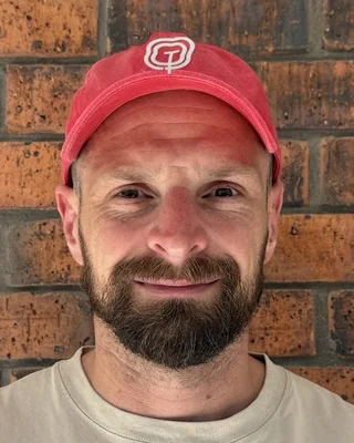 Nick Topham in a red Topham & Co cap