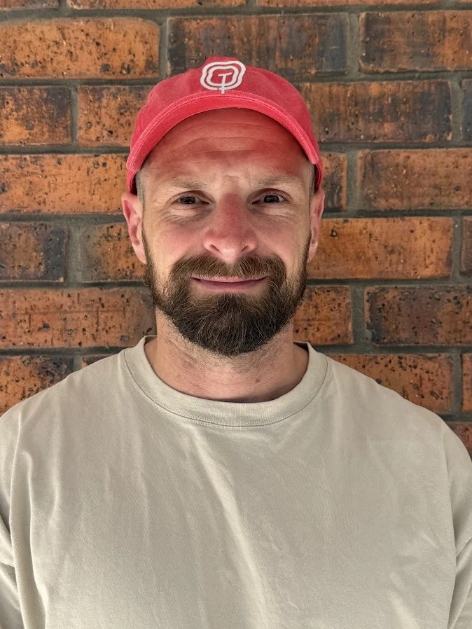 Nick Topham in a red Topham & Co cap